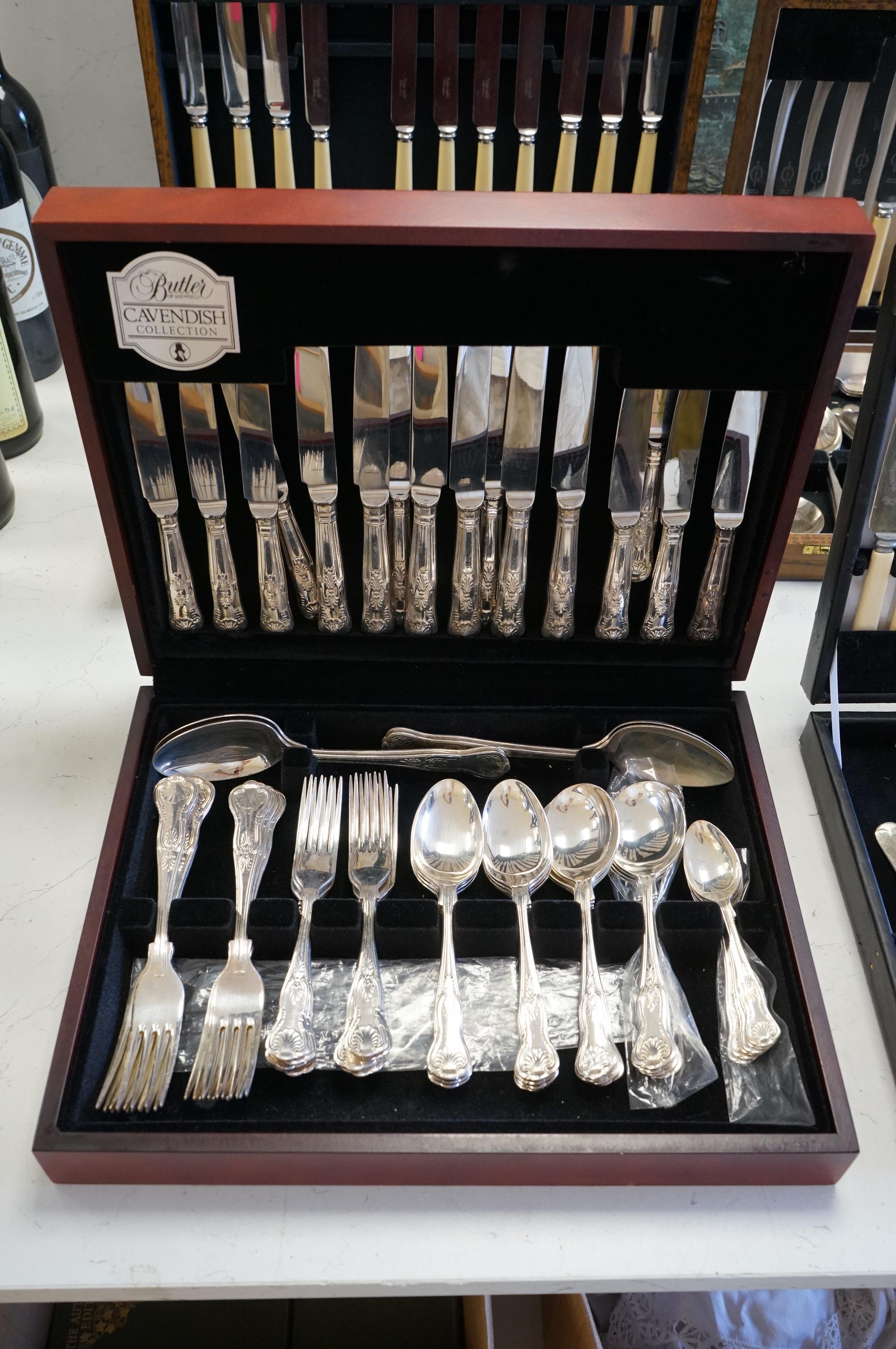 Four cased canteens of silver plated flatware including Kings pattern and Mappin plate